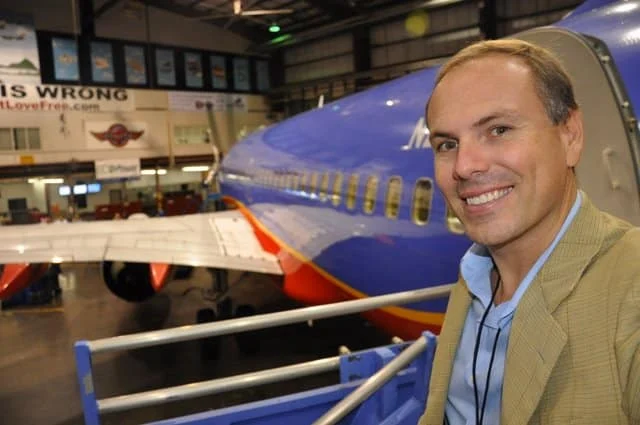 Johnny viewing a Southwest aircraft in Dallas.