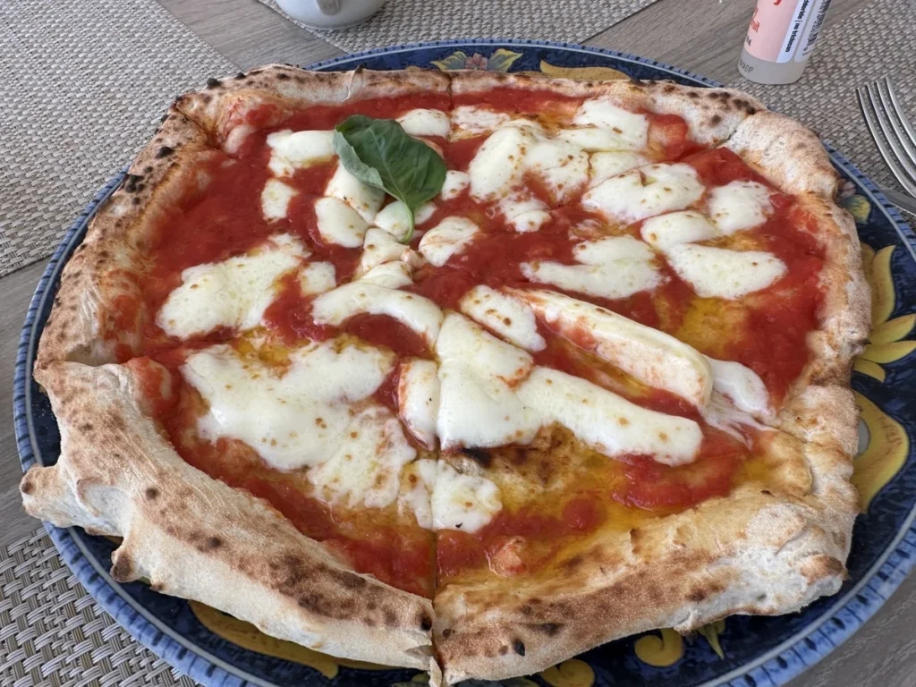 Pizza at the Royal Continental Hotel in Naples, Italy (June 2023).
